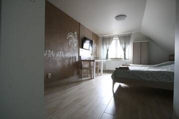 Фото номера Двухместный номер Делюкс с 1 кроватью Проживание в семье Noclegi Cameleon г. Слупца 12